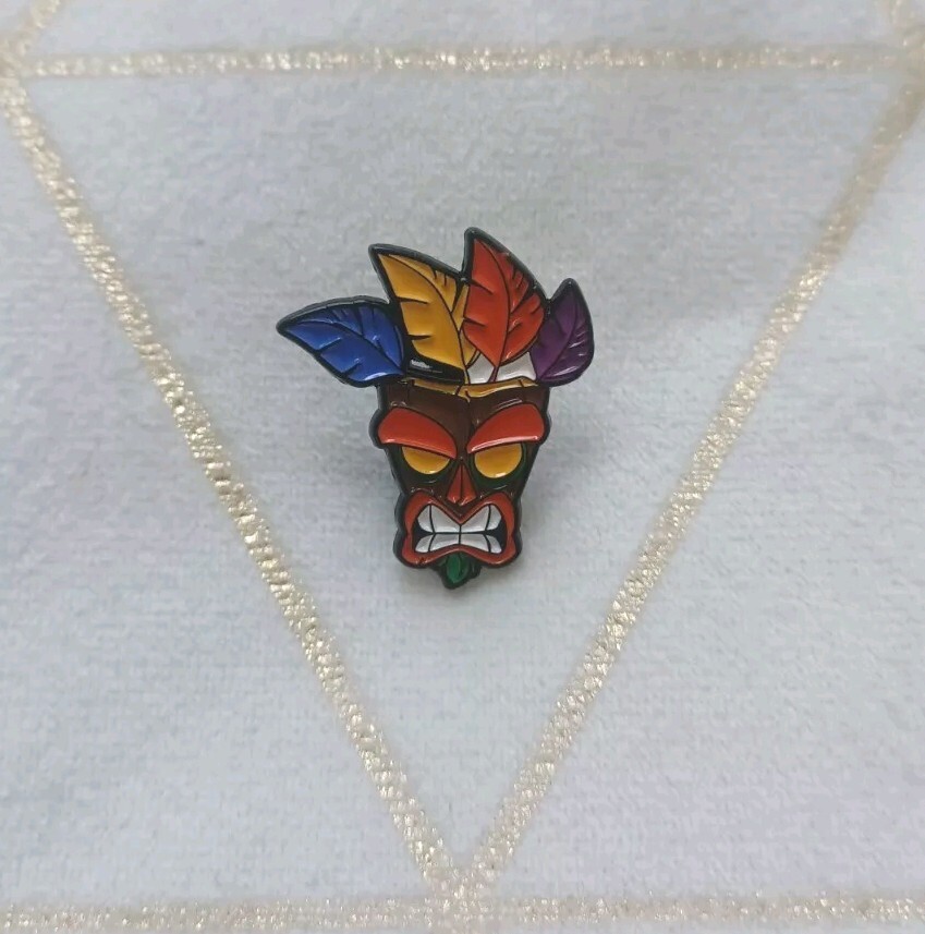 AKU AKU “Crash Bandicoot” VG (Ver.2) Tiki Ancient Mask Enamel Pin. “Brand New”.