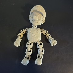 Articulated 3d Printed Mario Grey metal 4 inches tall
