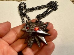 The Witcher 3 White Wolf Medallion LED Necklace from J!NX and cd Projekt RED