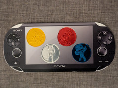Playstation PS VITA Pre-Release Promotional Coins RARE 2012 Set of 4 with Holder