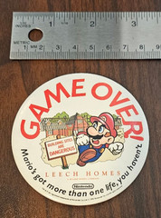 EX RARE 1992 licensed Nintendo Super Mario Bros. Leech Homes GAME OVER badge pin