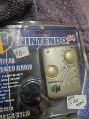 Nintendo 64 AM/FM Stereo Radio & 35mm Mega View Camera Earphones Armstrap