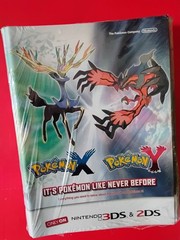 Rare 2013 Pack of 50 Nintendo Pokemon X and Y Promo game guide booklets